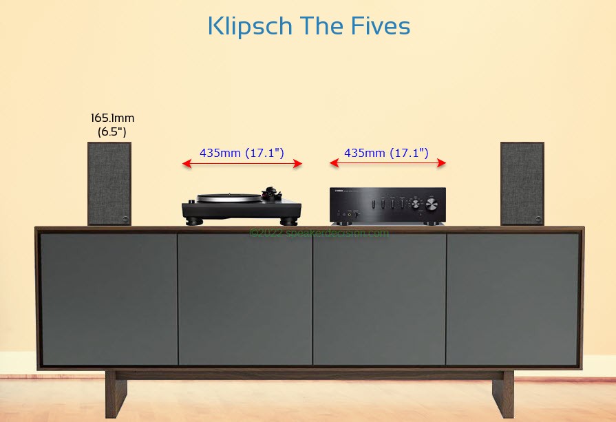 Klipsch The Fives placed next to an amplifier and turntable