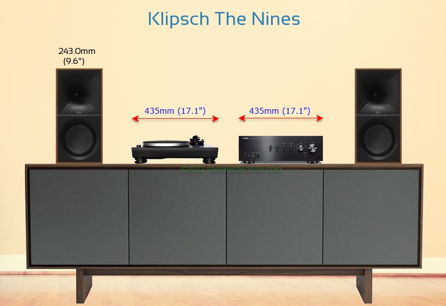 Klipsch The Nines placed next to an amplifier and turntable