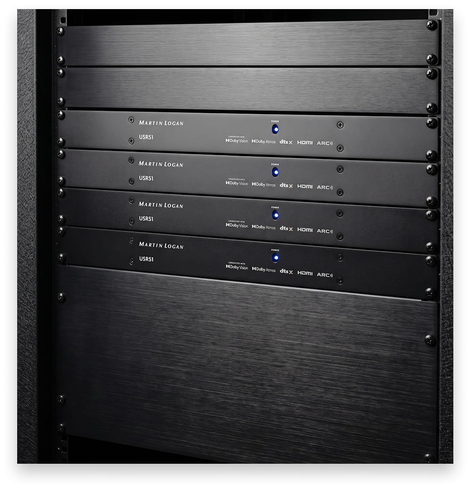 Four MartinLogan USR51 receivers stacked in a rack, one unit per 1U with the optional rack kit